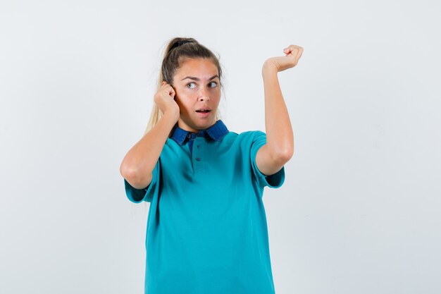 Expressive young girl posing in the studio