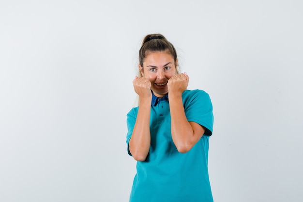 Expressive young girl posing in the studio