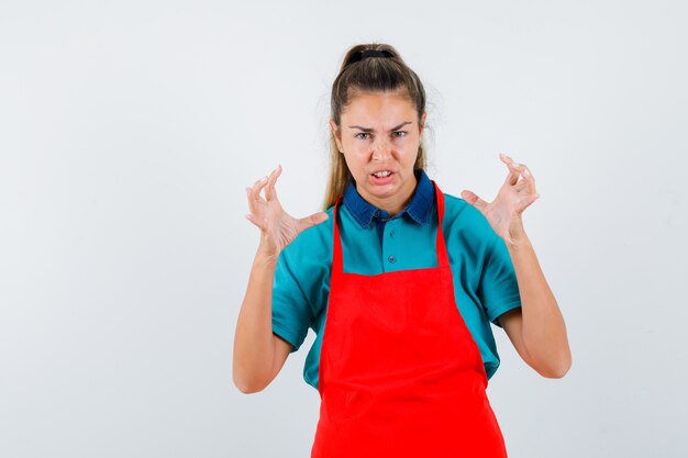 Expressive young girl posing in the studio