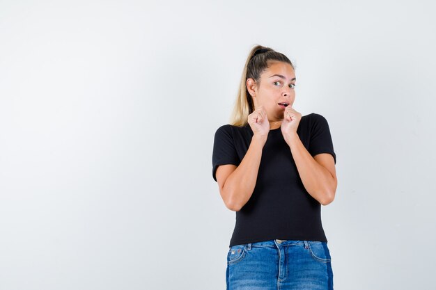 Expressive young girl posing in the studio