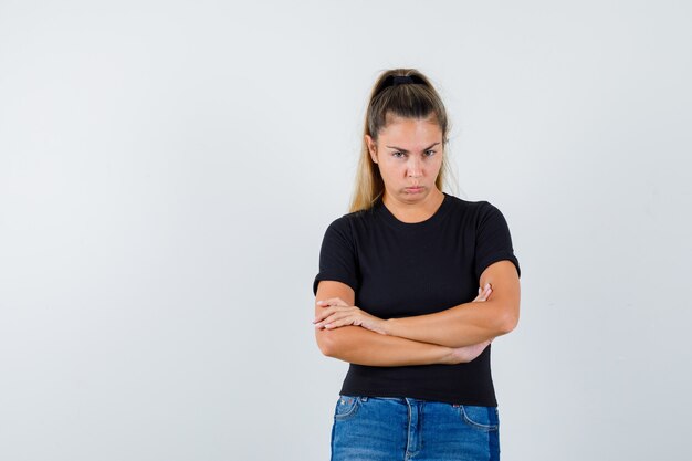 Expressive young girl posing in the studio