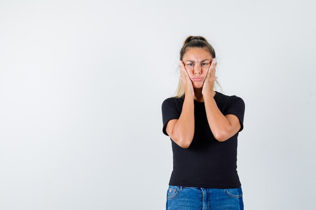 Expressive young girl posing in the studio