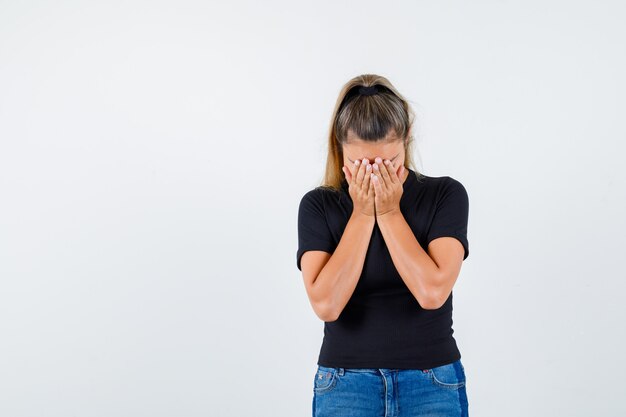 Expressive young girl posing in the studio