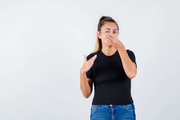 Expressive young girl posing in the studio