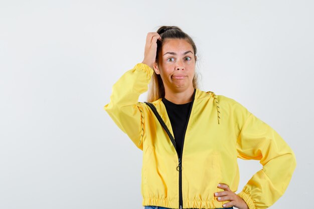 Expressive young girl posing in the studio