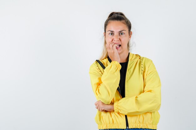 Expressive young girl posing in the studio