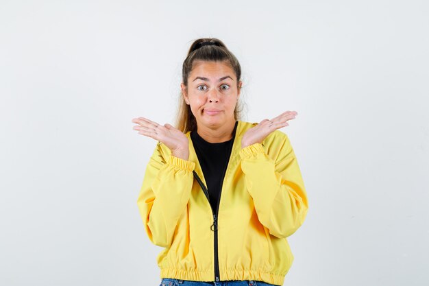 Expressive young girl posing in the studio