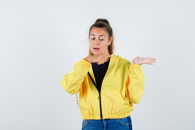 Expressive young girl posing in the studio