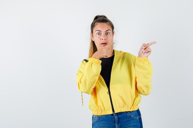 Expressive young girl posing in the studio