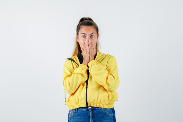 Expressive young girl posing in the studio