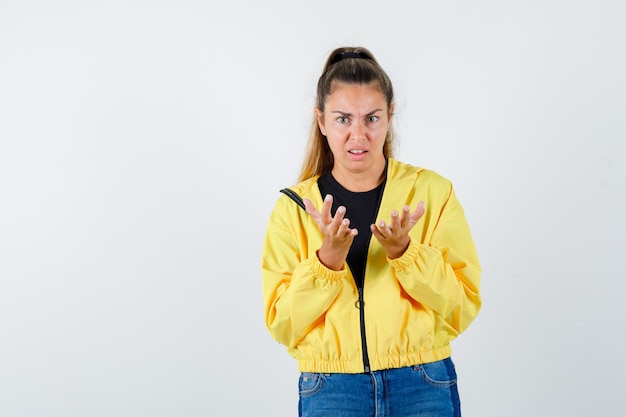 Expressive young girl posing in the studio