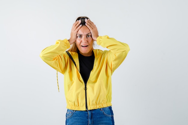 Expressive young girl posing in the studio