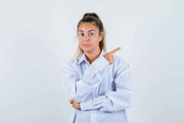 Expressive young girl posing in the studio