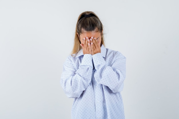 Expressive young girl posing in the studio