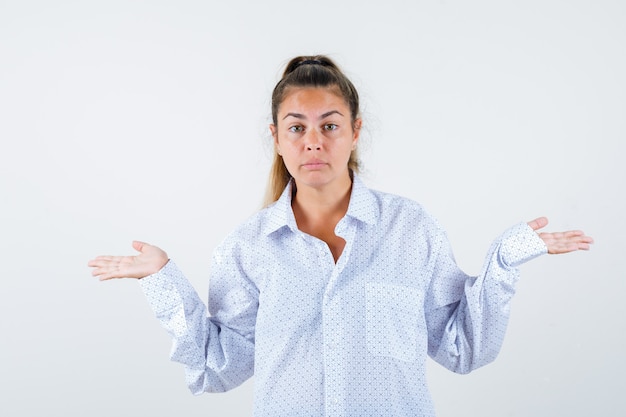 Expressive young girl posing in the studio