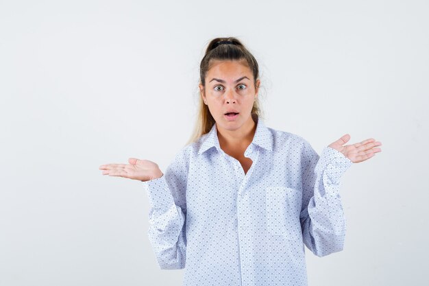 Expressive young girl posing in the studio