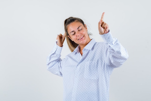 Expressive young girl posing in the studio