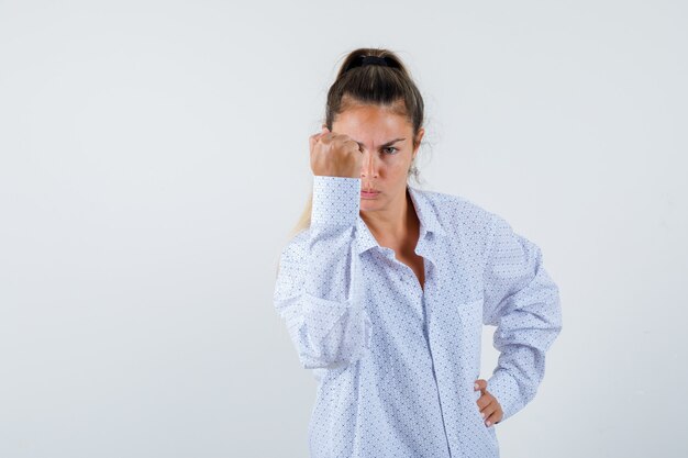 Expressive young girl posing in the studio