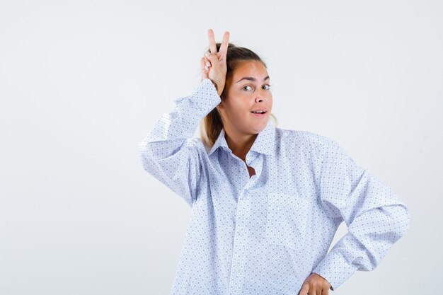 Expressive young girl posing in the studio