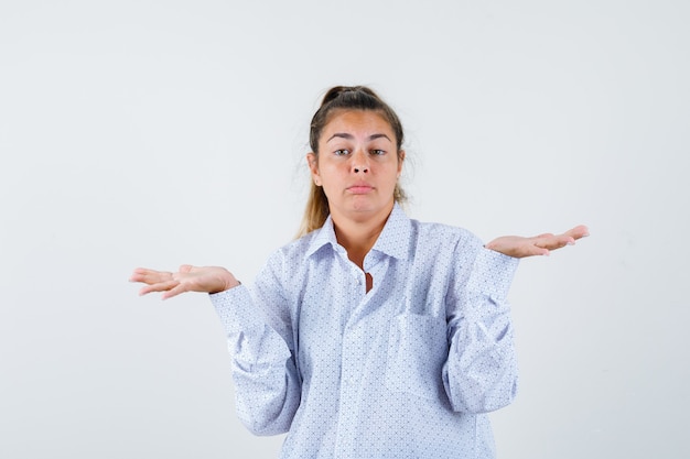 Expressive young girl posing in the studio