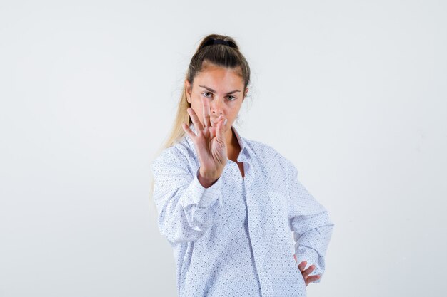 Expressive young girl posing in the studio