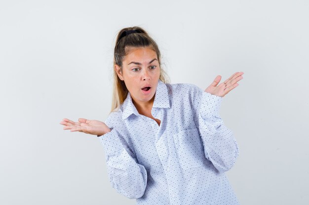 Expressive young girl posing in the studio