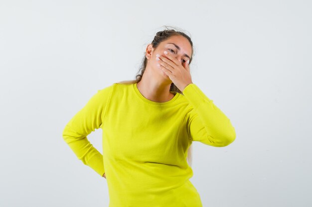 Expressive young girl posing in the studio