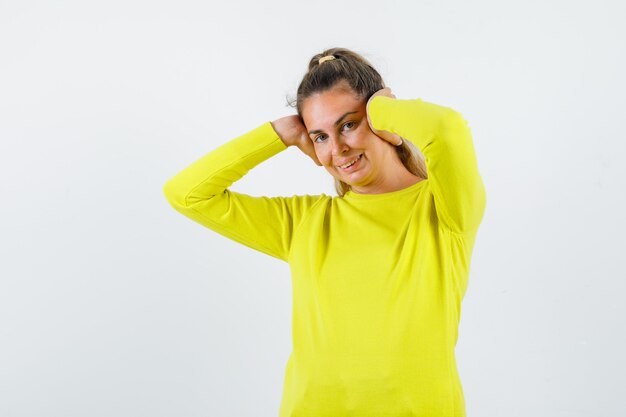 Expressive young girl posing in the studio