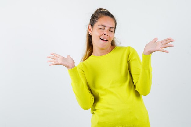 Expressive young girl posing in the studio