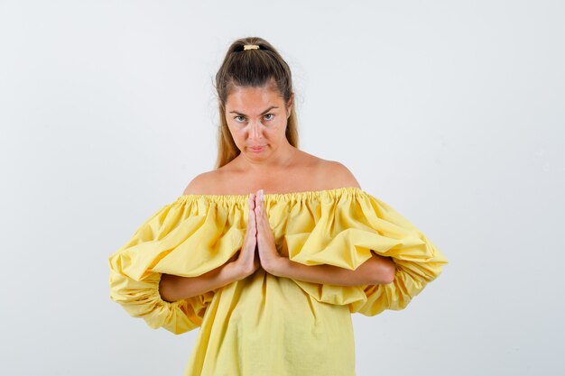 Expressive young girl posing in the studio