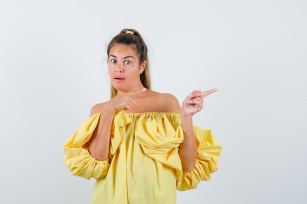 Expressive young girl posing in the studio