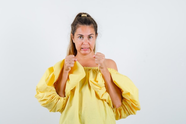 Expressive young girl posing in the studio