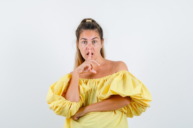 Expressive young girl posing in the studio