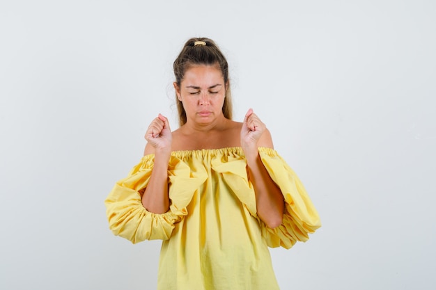 Expressive young girl posing in the studio