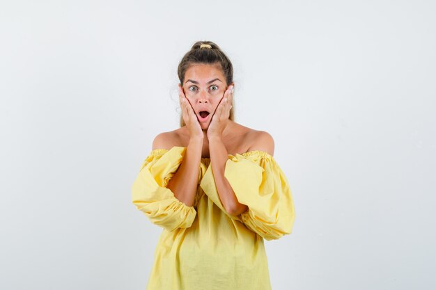 Expressive young girl posing in the studio