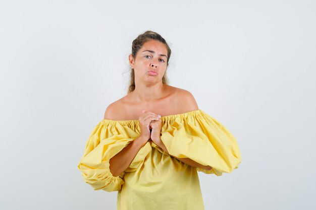 Expressive young girl posing in the studio