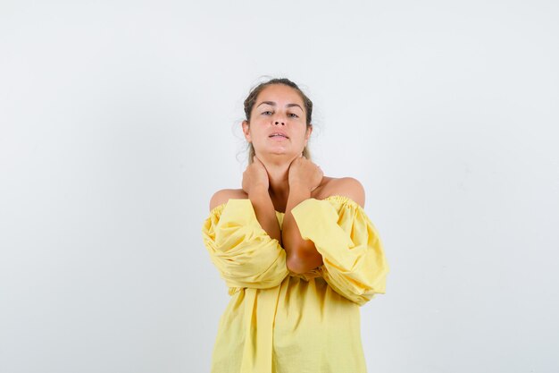 Expressive young girl posing in the studio