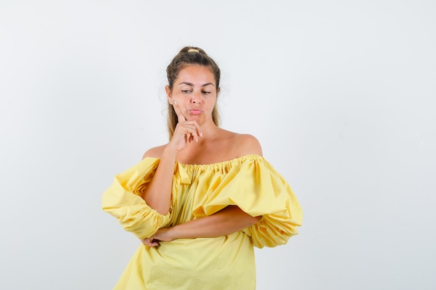 Expressive young girl posing in the studio