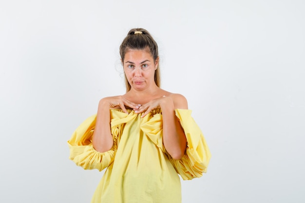 Expressive young girl posing in the studio