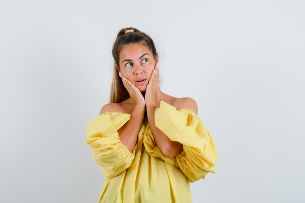 Expressive young girl posing in the studio