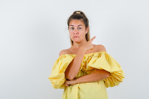 Expressive young girl posing in the studio