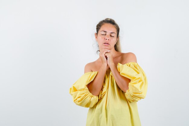 Expressive young girl posing in the studio