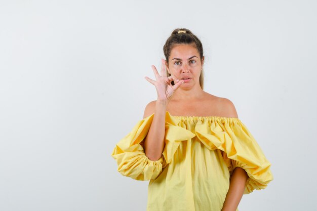 Expressive young girl posing in the studio