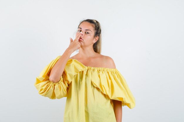 Expressive young girl posing in the studio