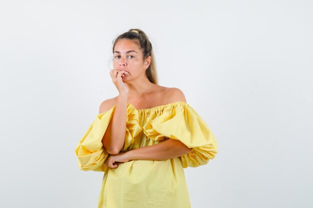 Expressive young girl posing in the studio