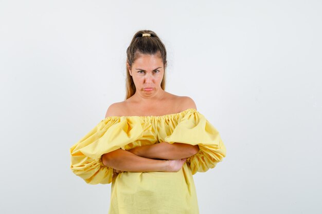 Expressive young girl posing in the studio