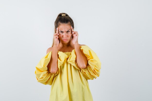 Expressive young girl posing in the studio