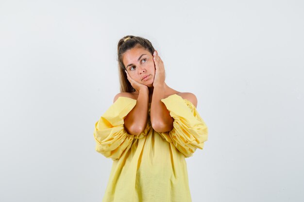 Expressive young girl posing in the studio