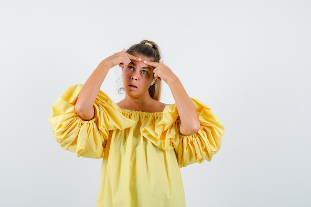 Expressive young girl posing in the studio