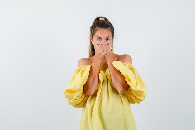 Expressive young girl posing in the studio